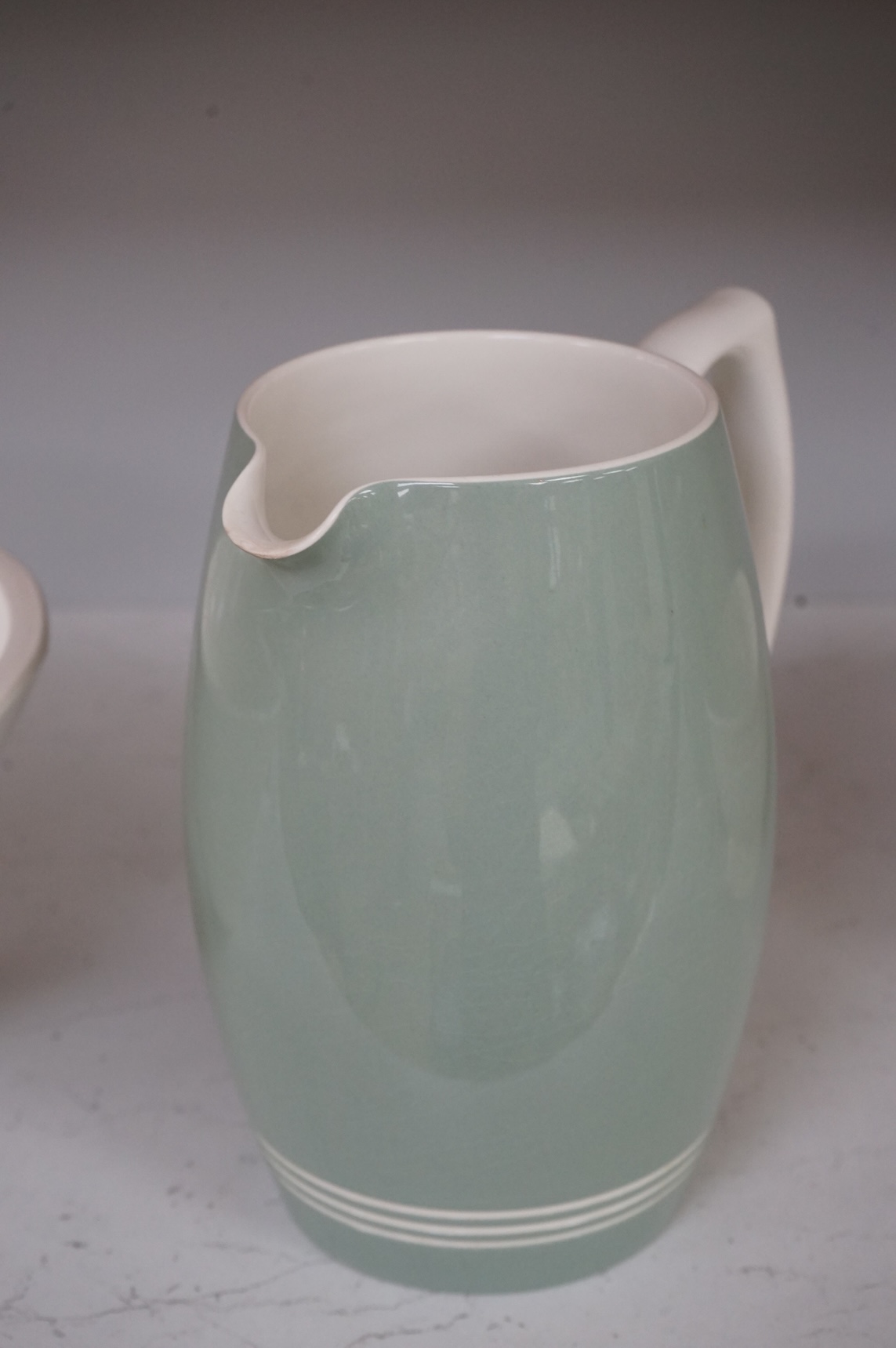 Keith Murray for Wedgwood, a green jug, 20.5cm high